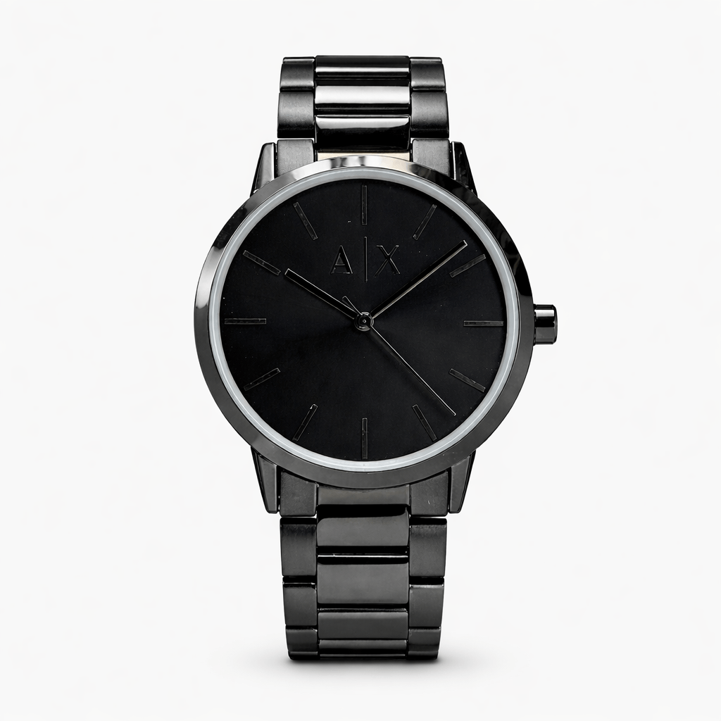 A|X Arm4ni Exch4nge full black minimalist watch with AX logo dial, gold-tone hands, and black PVD stainless steel bracelet held on velvet cushion
